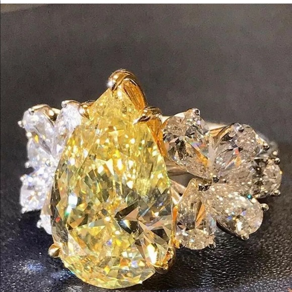 Size 78 yellow teardrop engagement ring